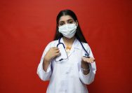 a doctor with a stethoscope around her neck