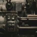 a black and white photo of an old train engine