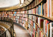 books on brown wooden shelf