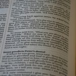 A close up of an open book on a table