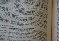 A close up of an open book on a table