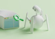 a small white person standing next to a small white object