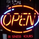 a lighted sign with a word on it