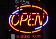 a lighted sign with a word on it