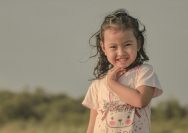 a little girl smiling