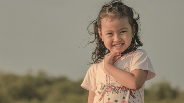 a little girl smiling